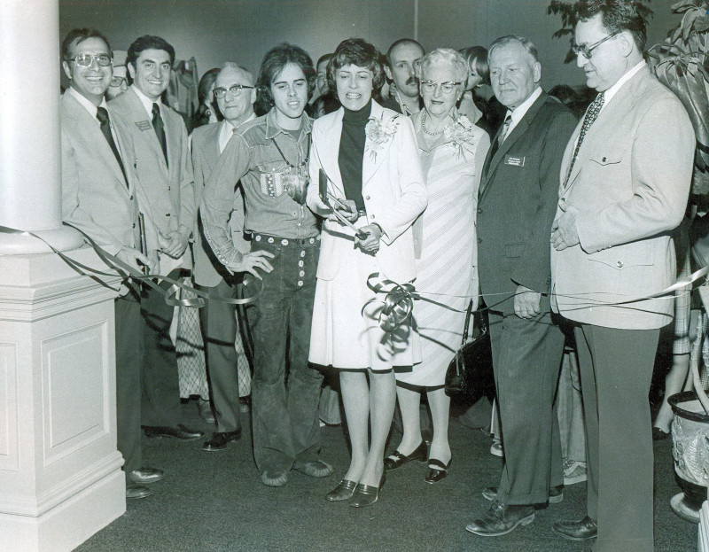 <p>Kay Turman (center) at the ribbon-cutting ceremony for the opening of the Missoula Museum of the Arts.</p>