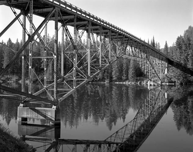 <p>Image: Kristi Hager, Heron Bridge, built 1920, moved to Heron in 1952 on Clark Fork River, Heron Road, near Heron, Sanders County, cantilevered deck truss, now demolished, archival digital print from scanned 4-by-5 negative. </p><p></p>